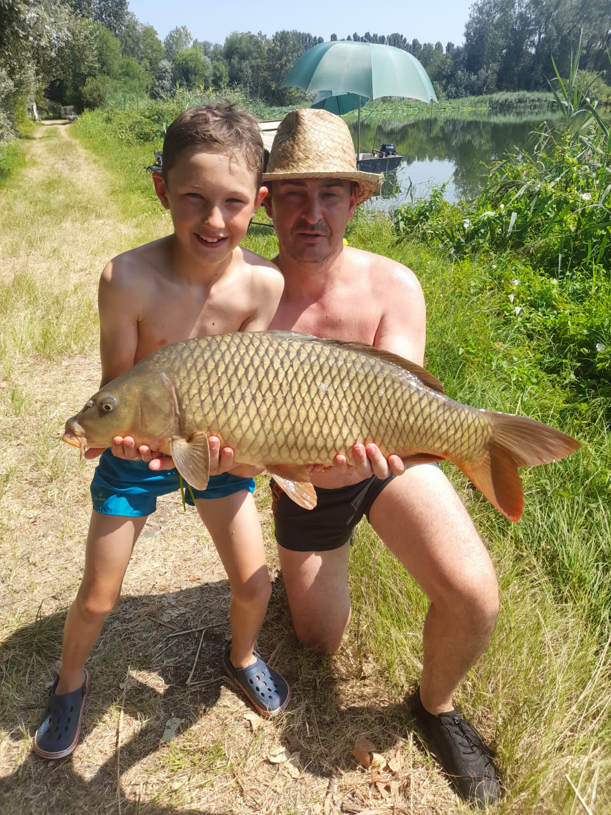 Schuppenkarpfen Gäste am Lago Superiore Familienfang am Schuppenkarpfen